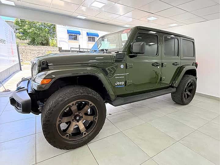 2022 Jeep Wrangler Unlimited Sahara 4XE usado en venta por Car's And Home's On Sale Chos